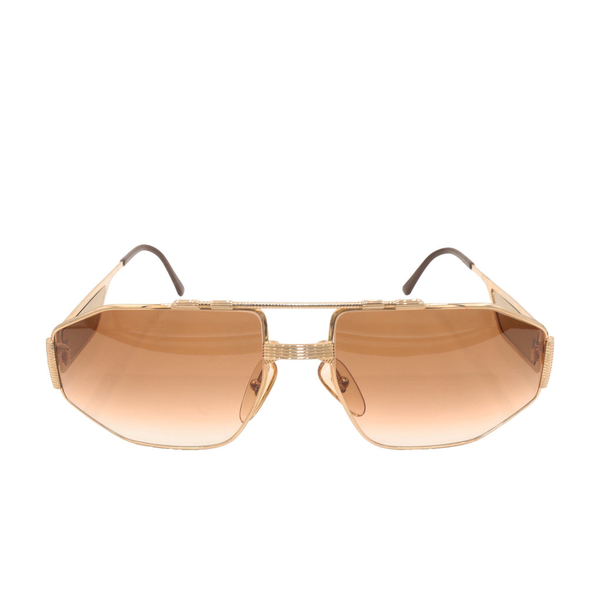 Gold sunglasses by Christian Dior.