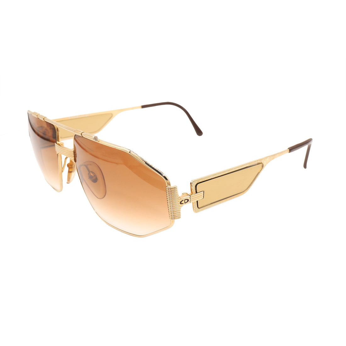 نظارات شمسية ذهبية من CHRISTIAN DIOR. - Barakat Optical